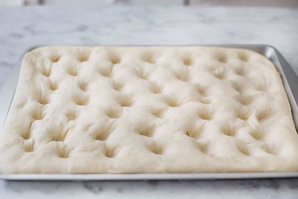 how to make the holes in the ligurian focaccia.