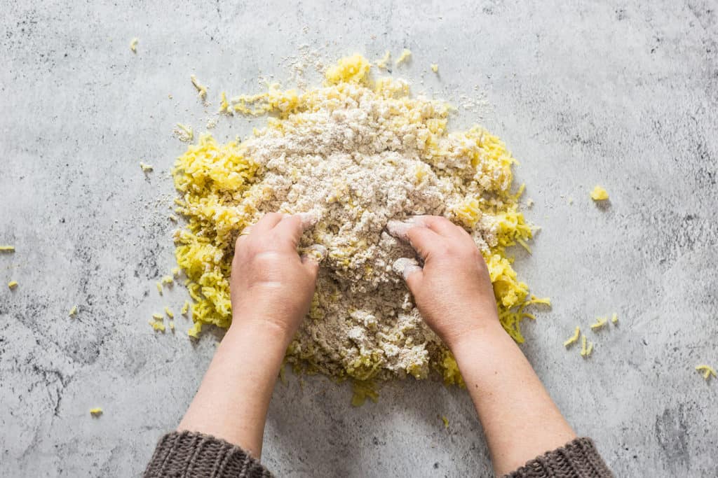 Integrating ingredients to make whole wheat gnocchi.