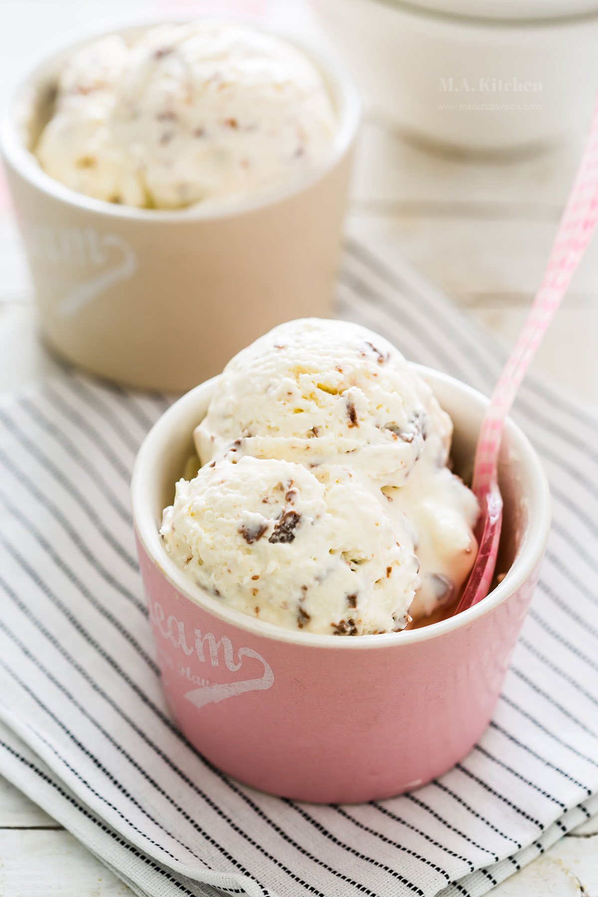 Stracciatella gelato ice cream served in two cups.