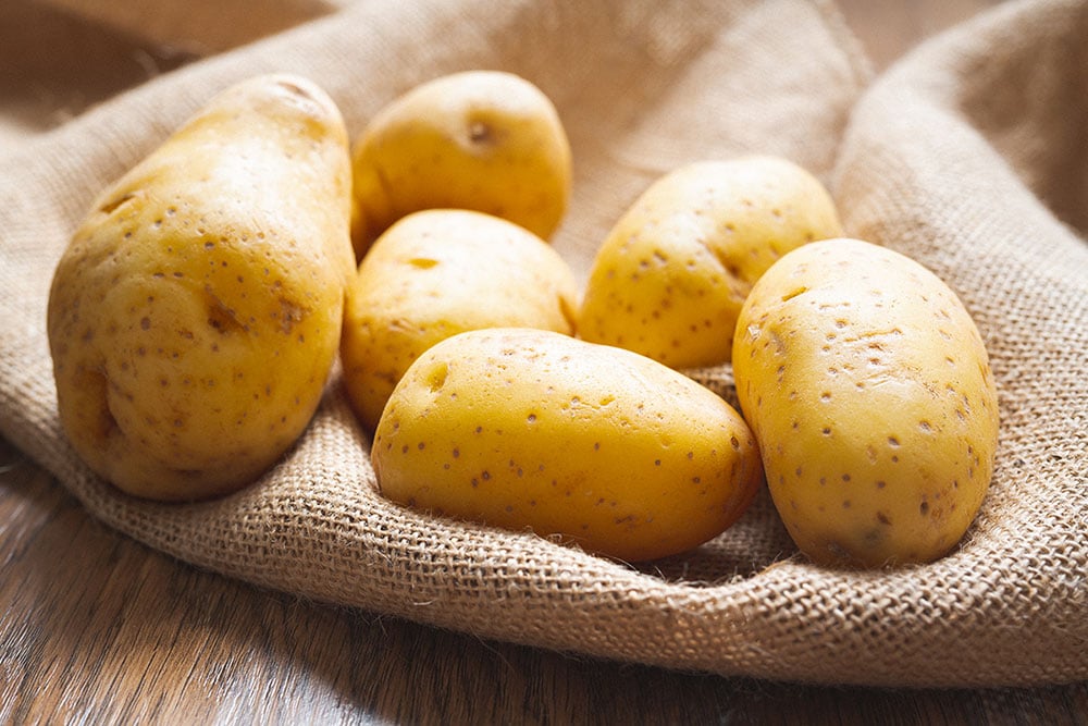 Yukon potatoes on a table.