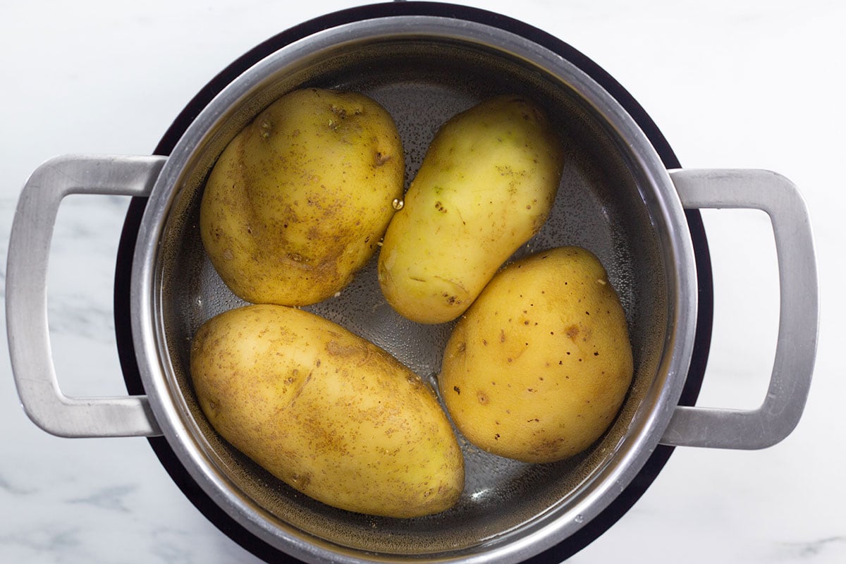 Cooking potatoes in a pot.