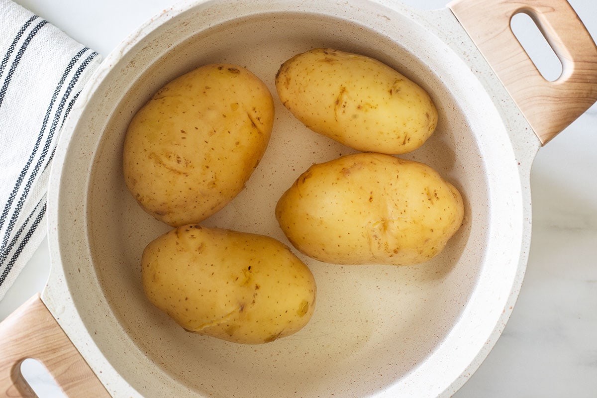Potatoes cooked in a pot.