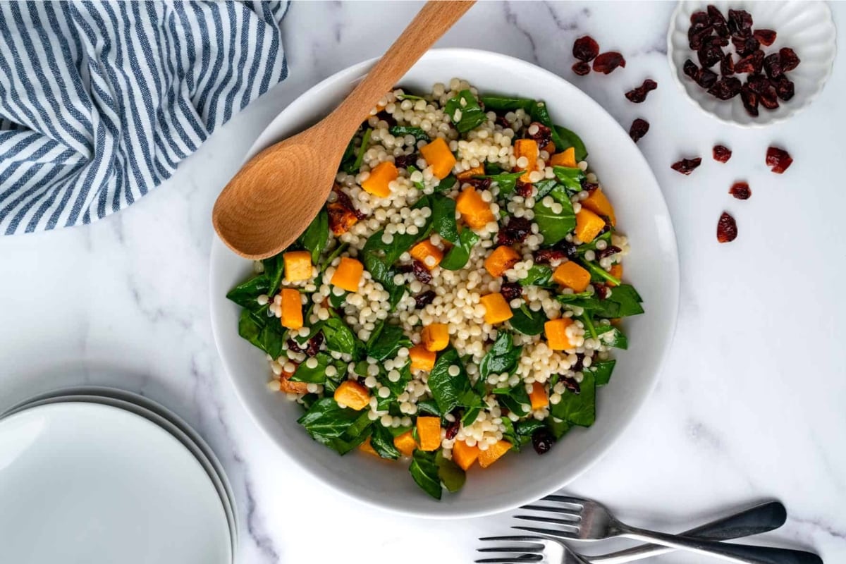 Butternut squash and couscous salad on a plate.