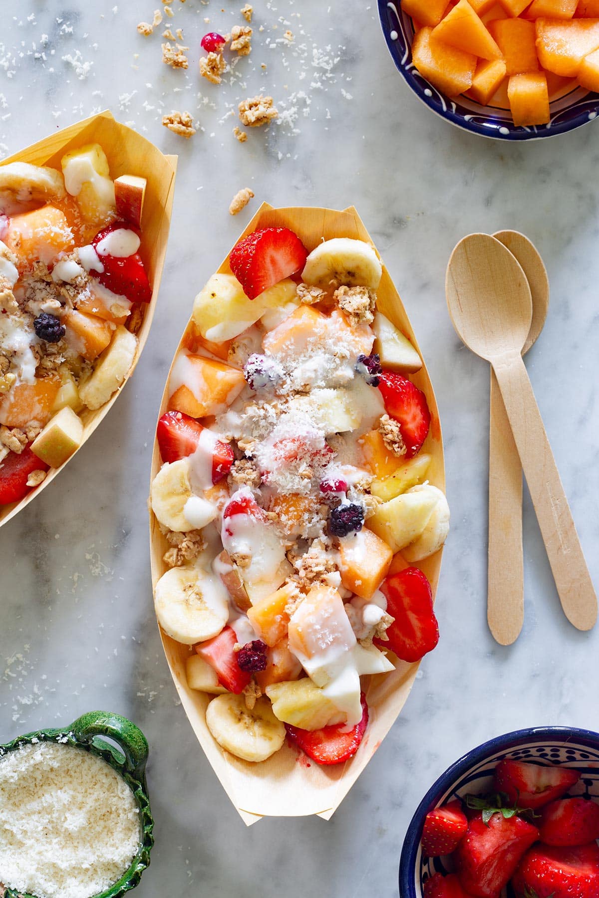 Mexican Biónicos topped with crunchy granola and coconut.