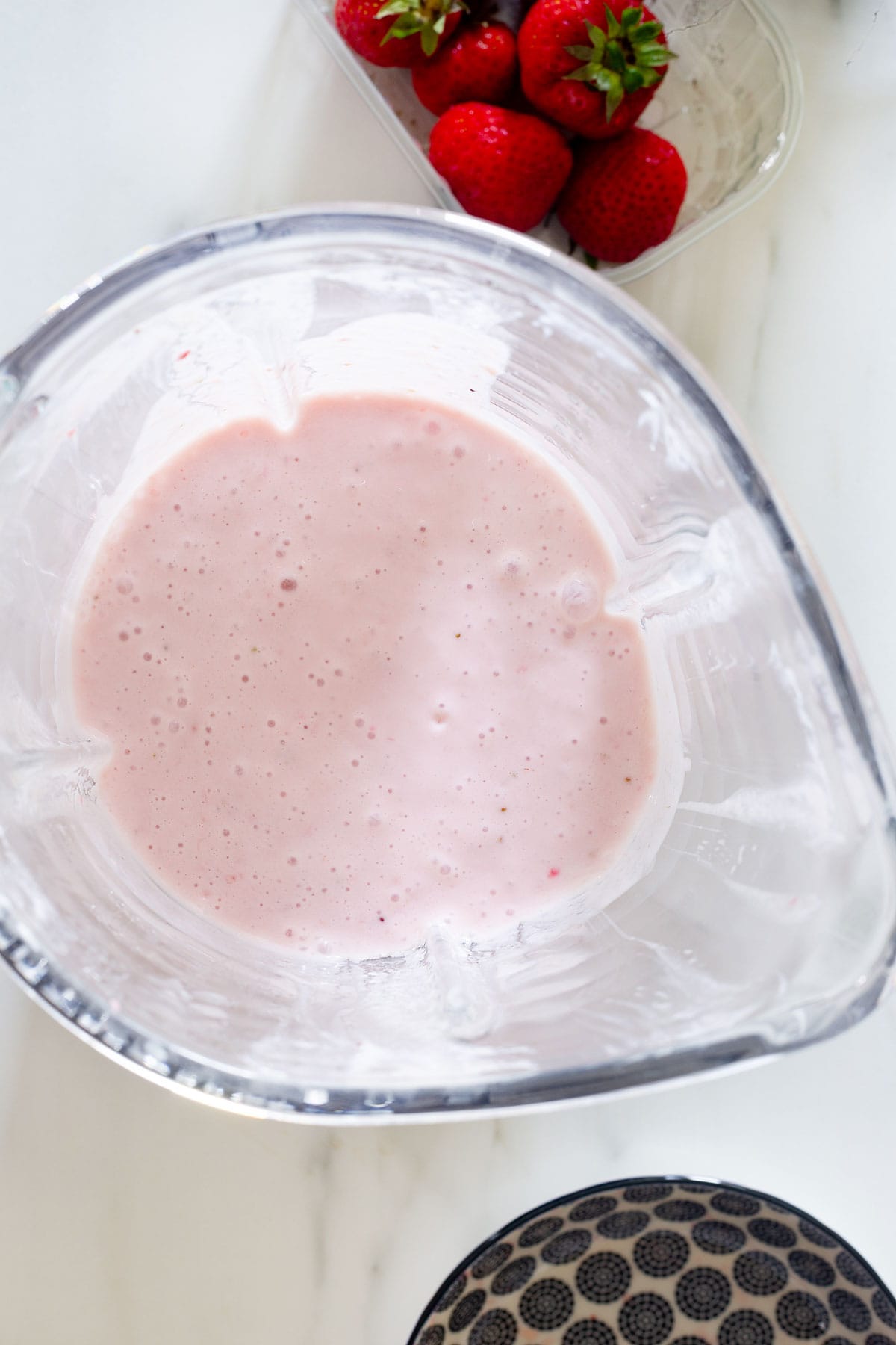 Strawberries and evaporated milk and condensed milk, blended.
